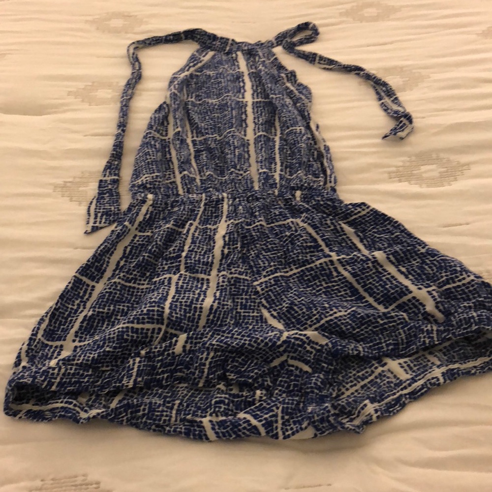 Backless blue and white romper.